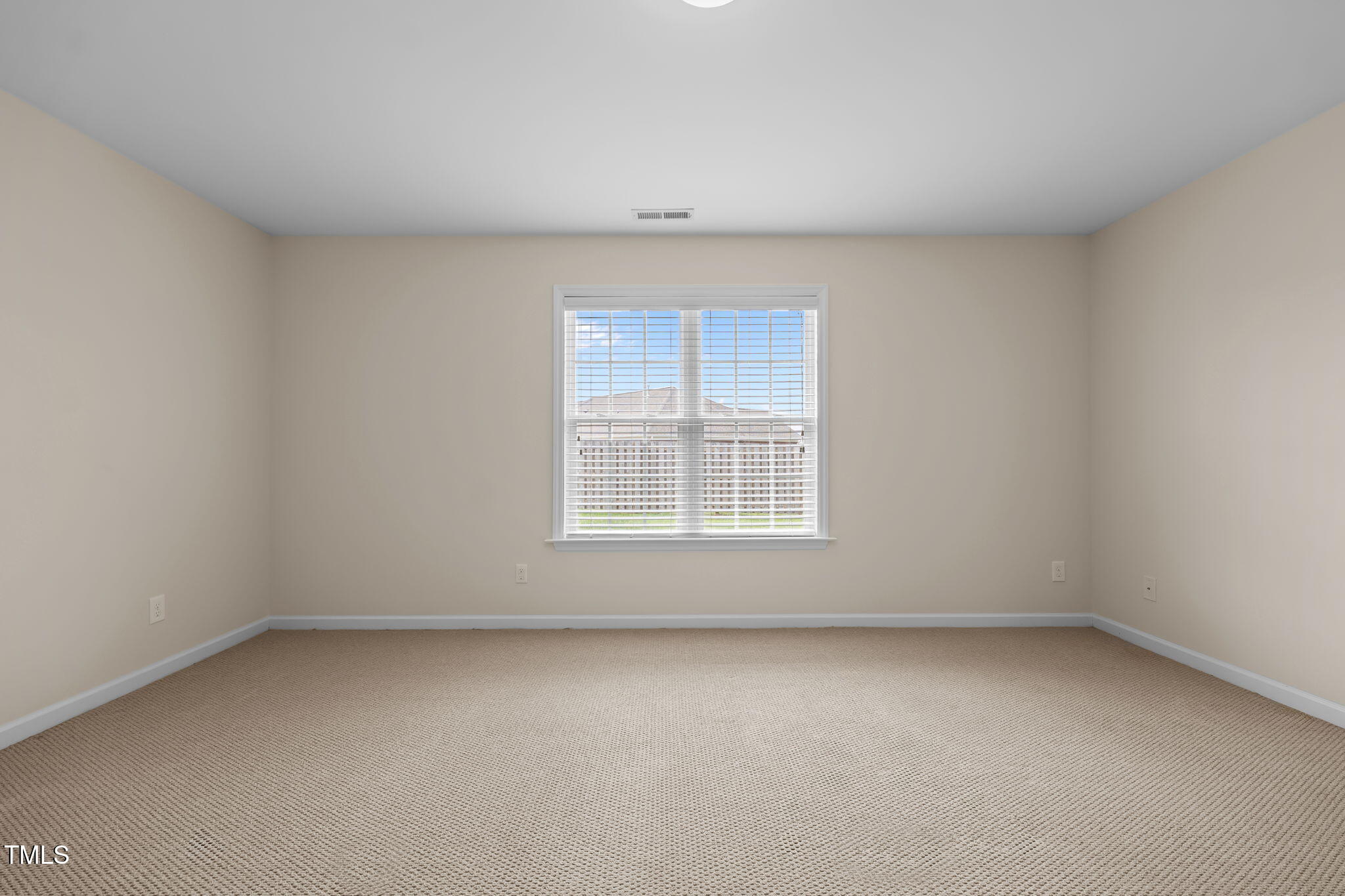 2002 Guinness Drive, Unit 5 Graham, NC 27253 - Photo 24 of 30 an empty room with a window