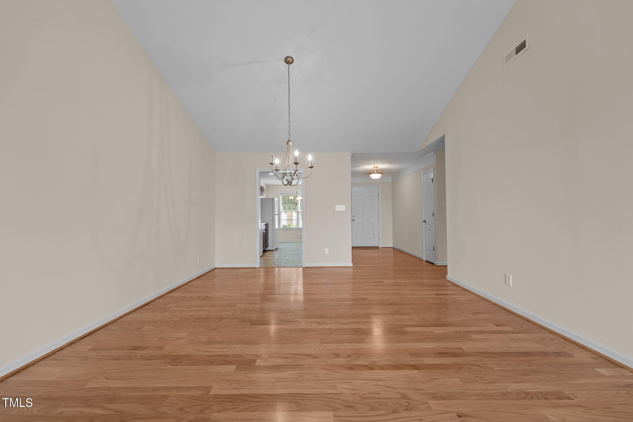 2002 Guinness Drive, Unit 5 Graham, NC 27253 - Photo 7 of 30 a view of empty room with wooden floor
