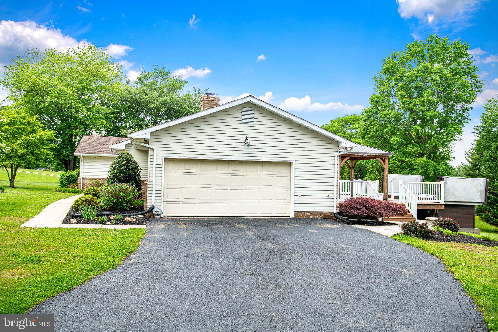 14300 Carroll Ridge Court Baldwin, MD 21013 - Photo 67 of 73 a front view of a house with a yard and garage