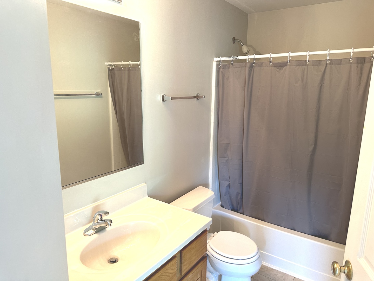 5900 Dublin Court, Unit 5900 McHenry, IL 60050 - Photo 12 of 14 a bathroom with a sink toilet and shower