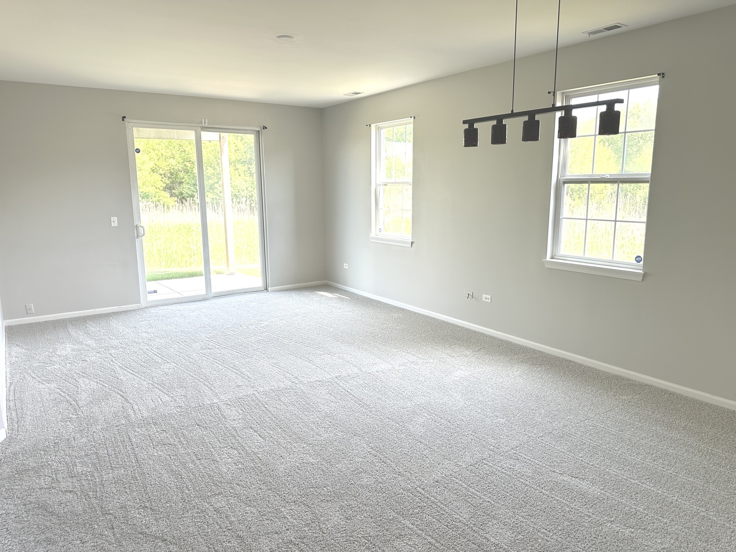 5900 Dublin Court, Unit 5900 McHenry, IL 60050 - Photo 13 of 14 an empty room with windows and closet