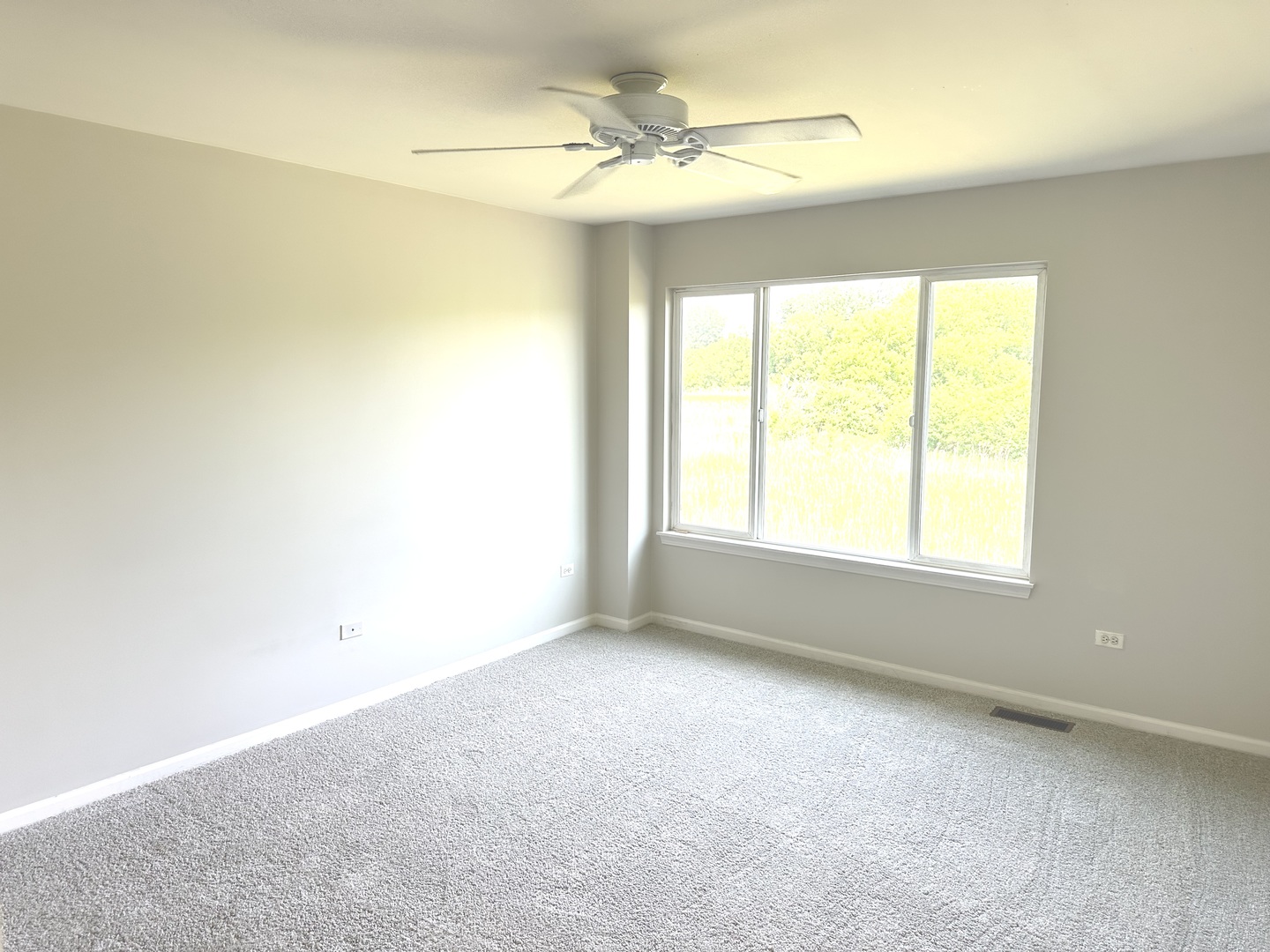 5900 Dublin Court, Unit 5900 McHenry, IL 60050 - Photo 6 of 14 a view of an empty room with a window