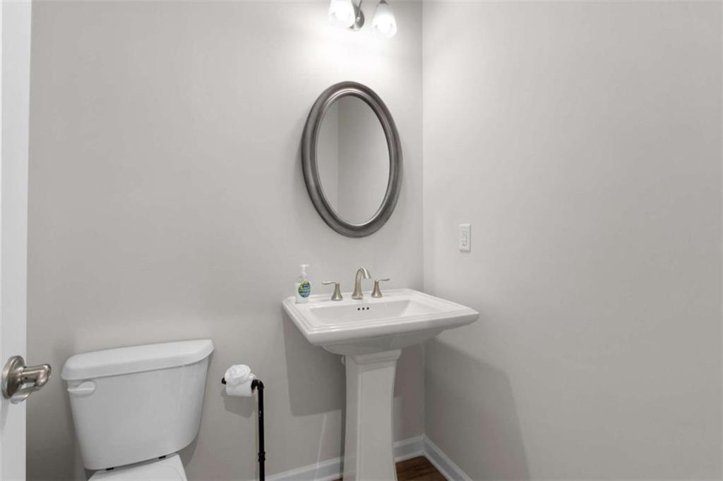 15 Parkside View Cartersville, GA 30121 - Photo 21 of 43 a bathroom with a sink a mirror and a toilet