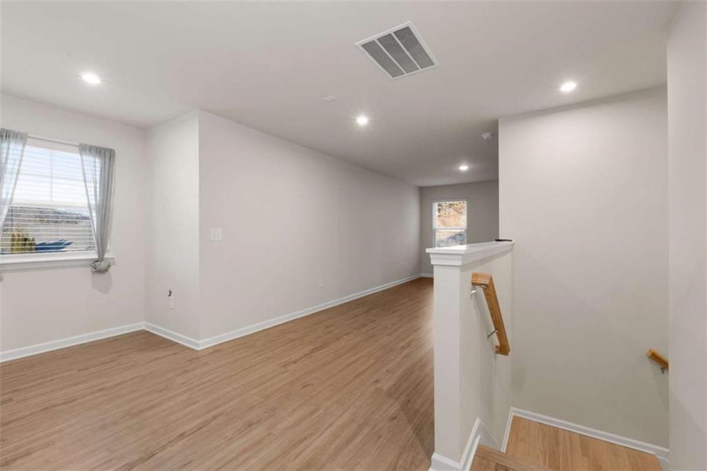 15 Parkside View Cartersville, GA 30121 - Photo 27 of 43 wooden floor in an empty room with a window