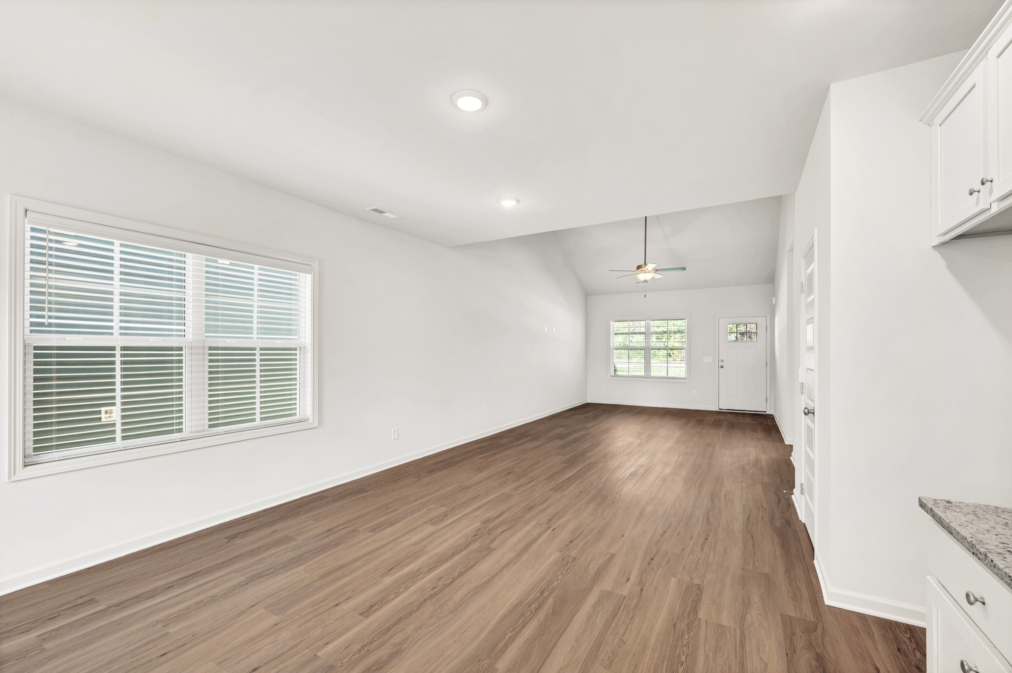 7103 Wiley Circle Fairview, TN 37062 - Photo 14 of 33 a view of an empty room with wooden floor and a window