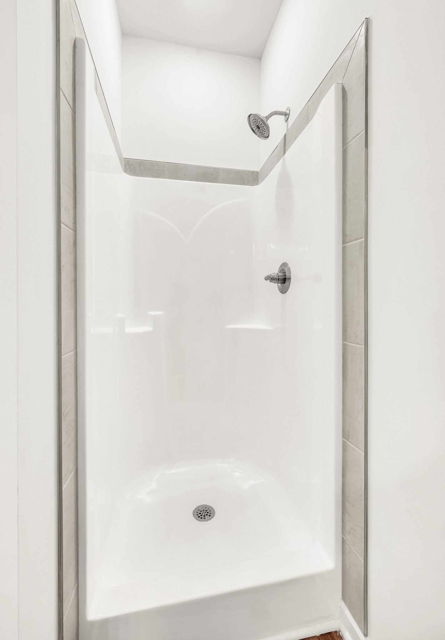 7103 Wiley Circle Fairview, TN 37062 - Photo 21 of 33 a bathroom with a glass shower door