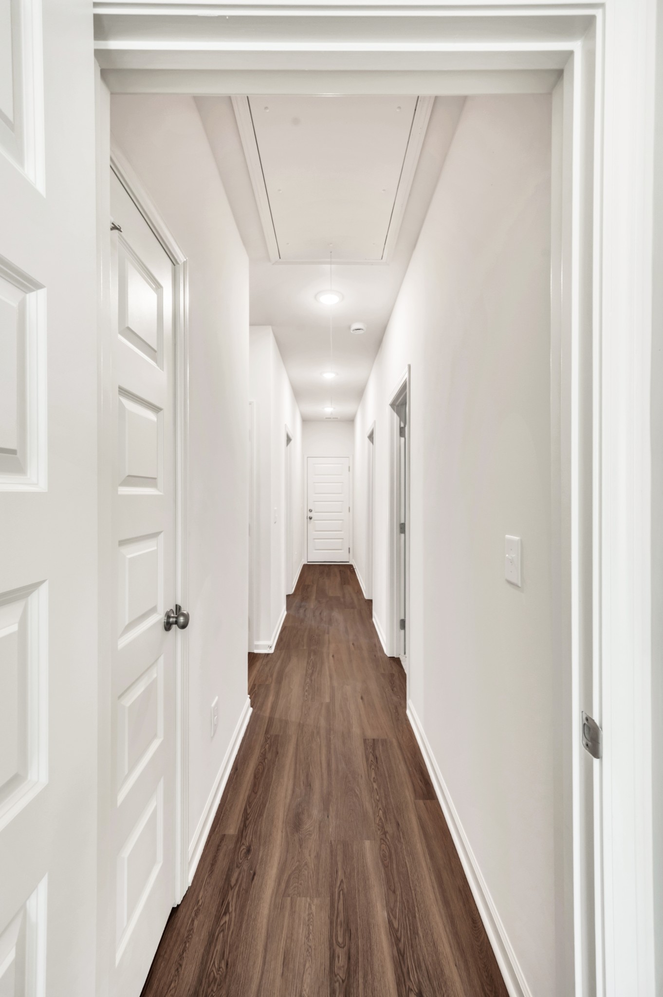 7103 Wiley Circle Fairview, TN 37062 - Photo 23 of 33 a view of a hallway with wooden floor and staircase