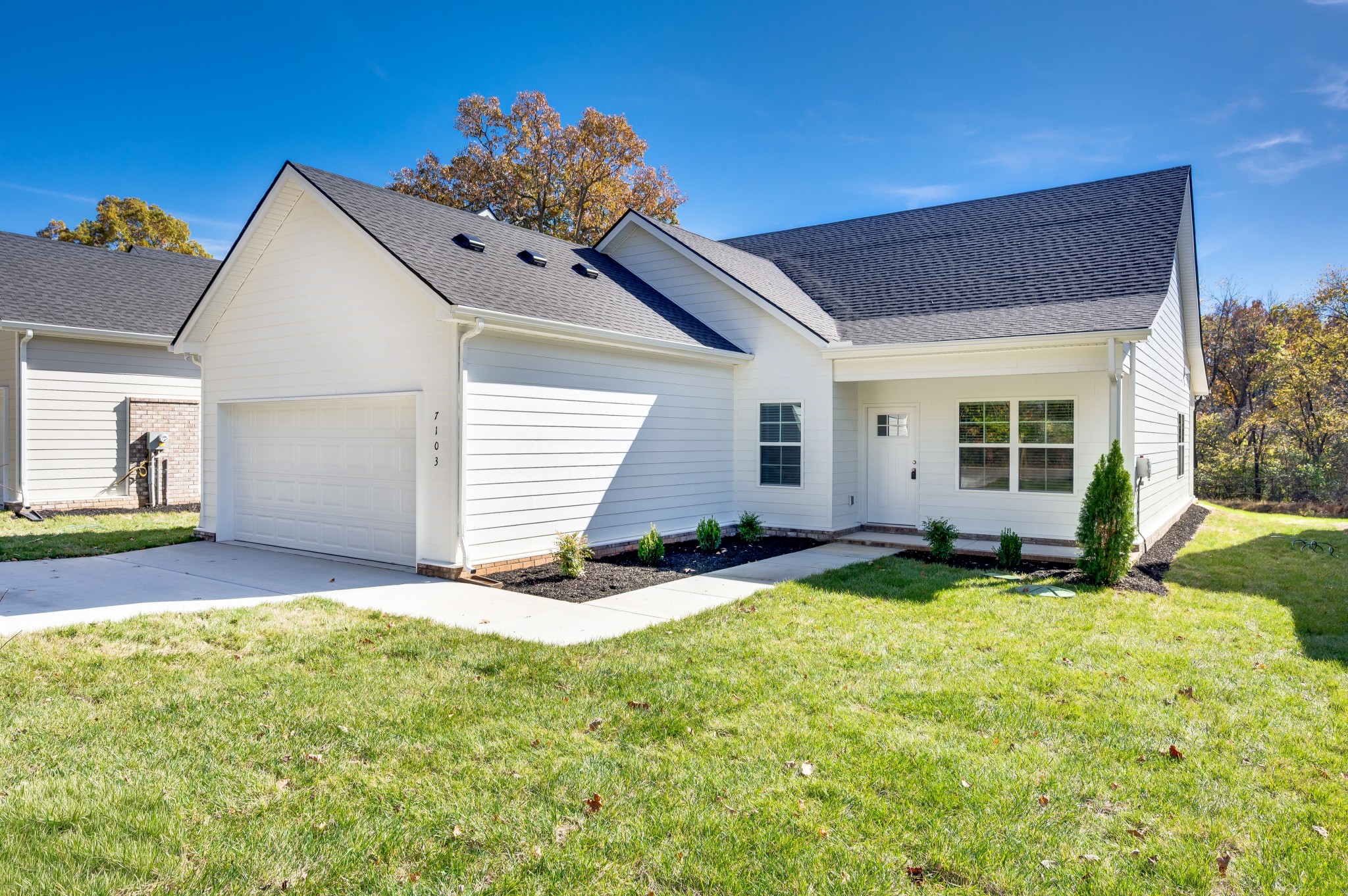 7103 Wiley Circle Fairview, TN 37062 - Photo 4 of 33 a view of a house with backyard and sitting area