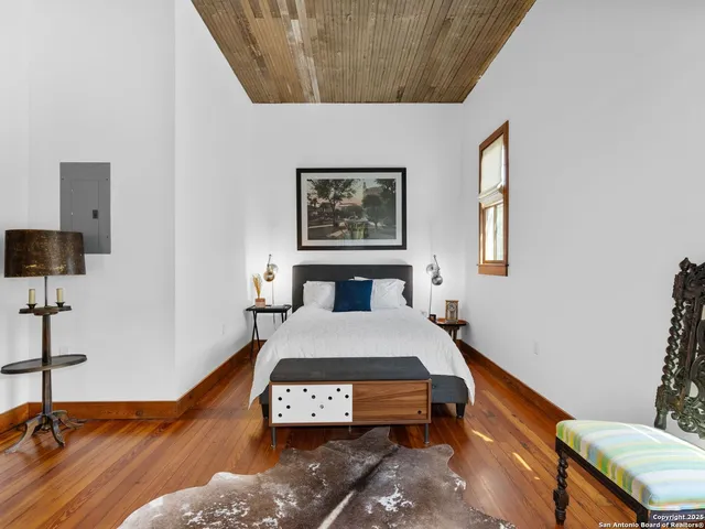 a room with furniture and a wooden floor