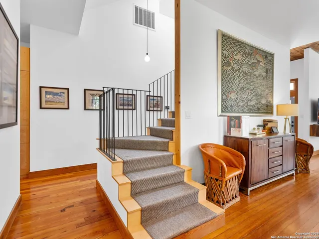 a living room with furniture and a rug