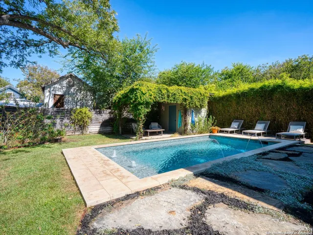 a view of a backyard with a garden