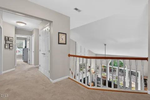 a bedroom with a bed and cabinets