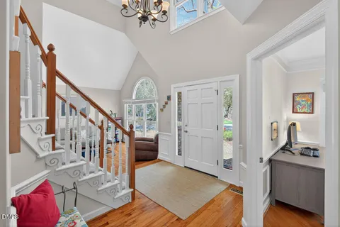 a view of a livingroom with furniture and toys