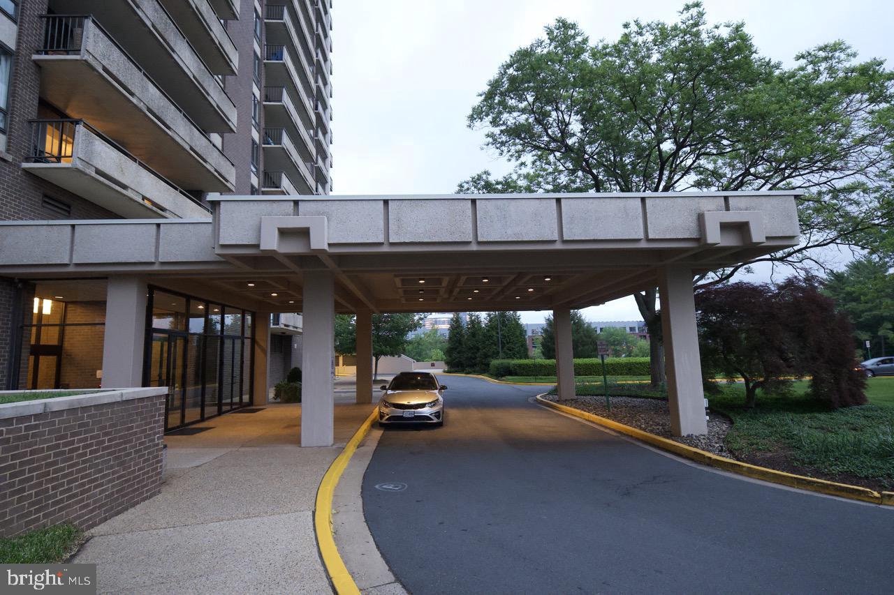 1800 Old Meadow Road, Unit 818 McLean, VA 22102 - Photo 30 of 35 a view of street with parked cars