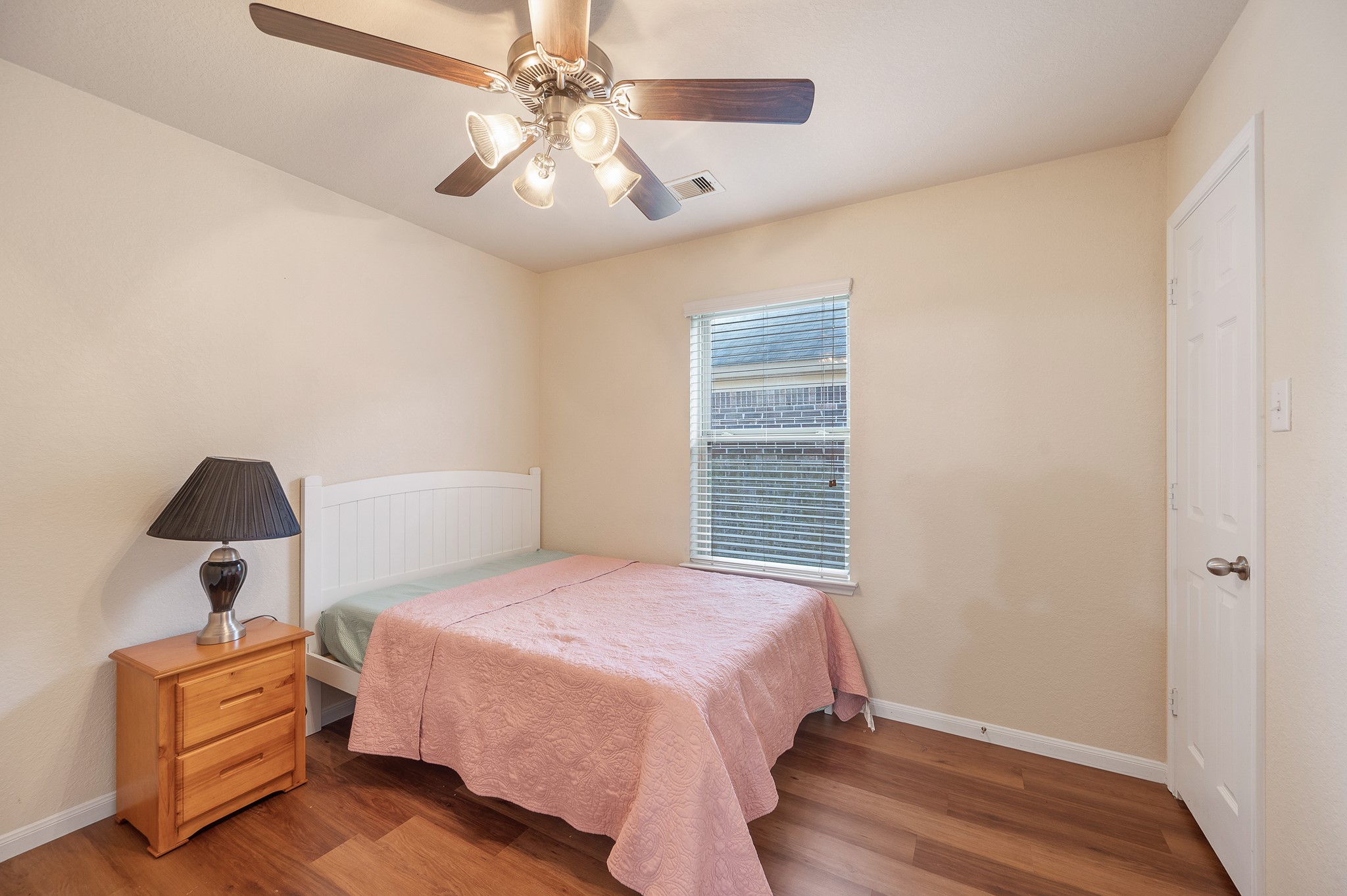 23454 Quarry Path Way Katy, TX 77493 - Photo 11 of 39 a bedroom with a bed and a chandelier