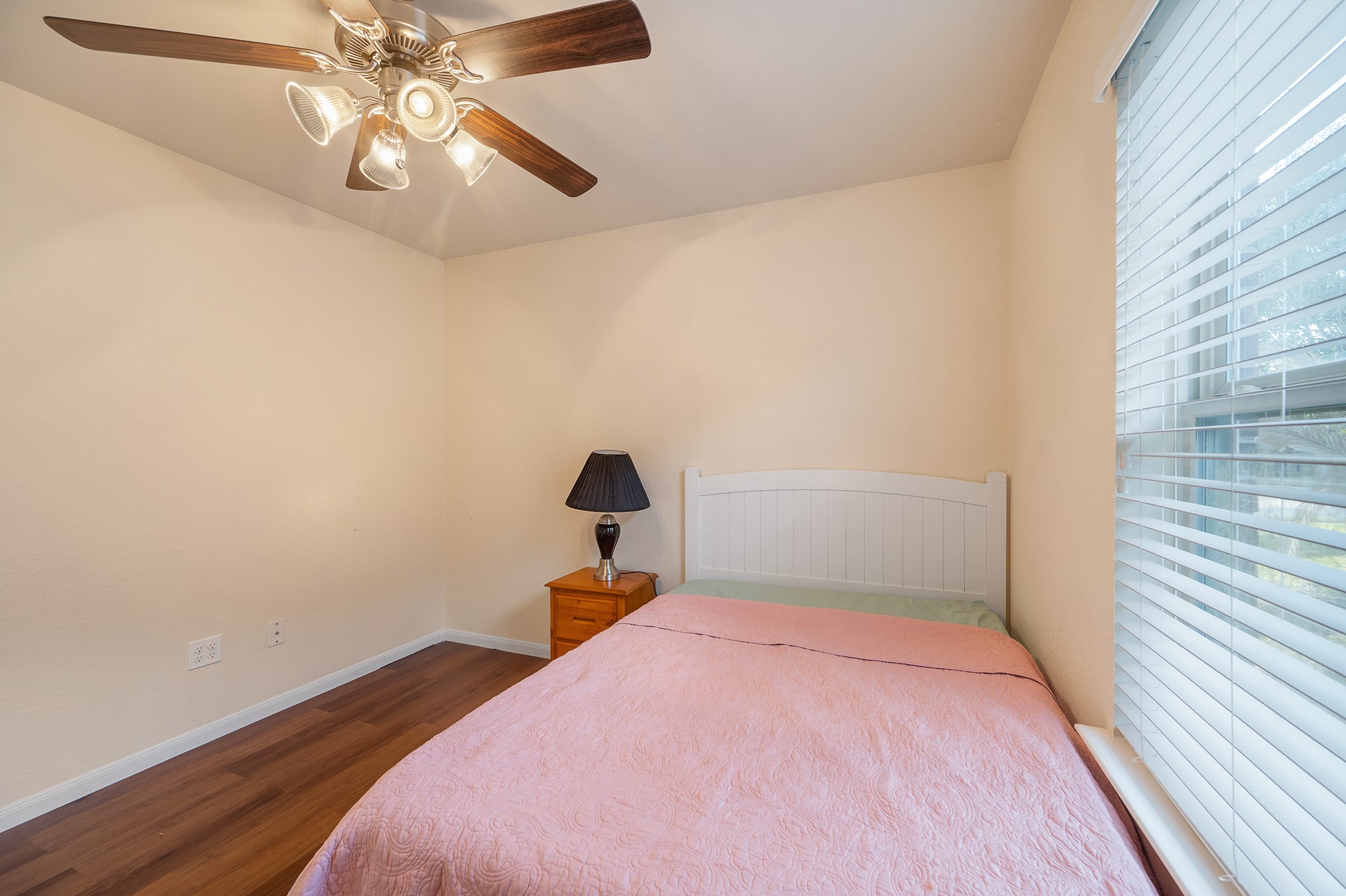 23454 Quarry Path Way Katy, TX 77493 - Photo 12 of 39 a bedroom with a bed and a chandelier