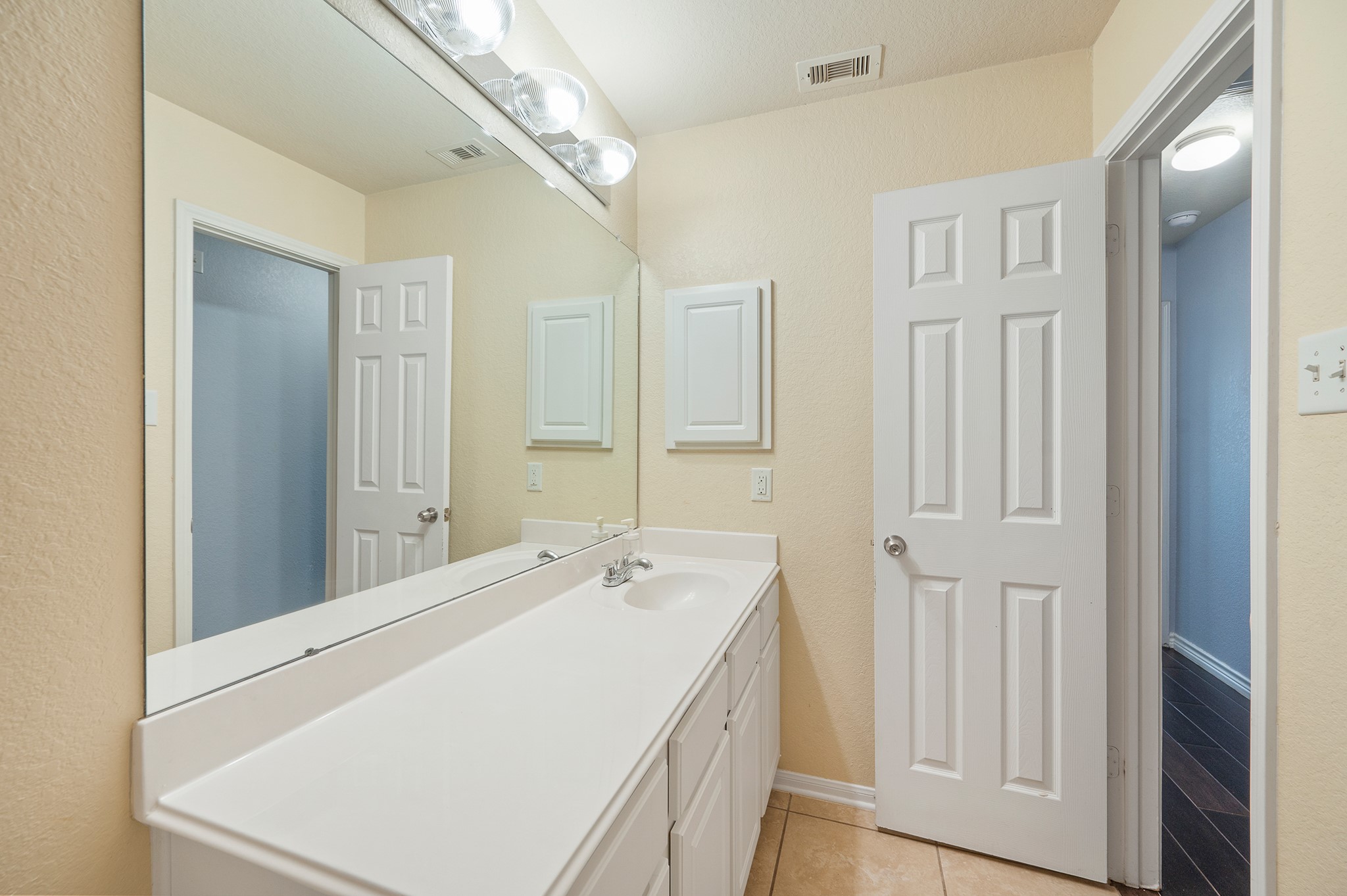 23454 Quarry Path Way Katy, TX 77493 - Photo 14 of 39 a bathroom with a sink and a mirror