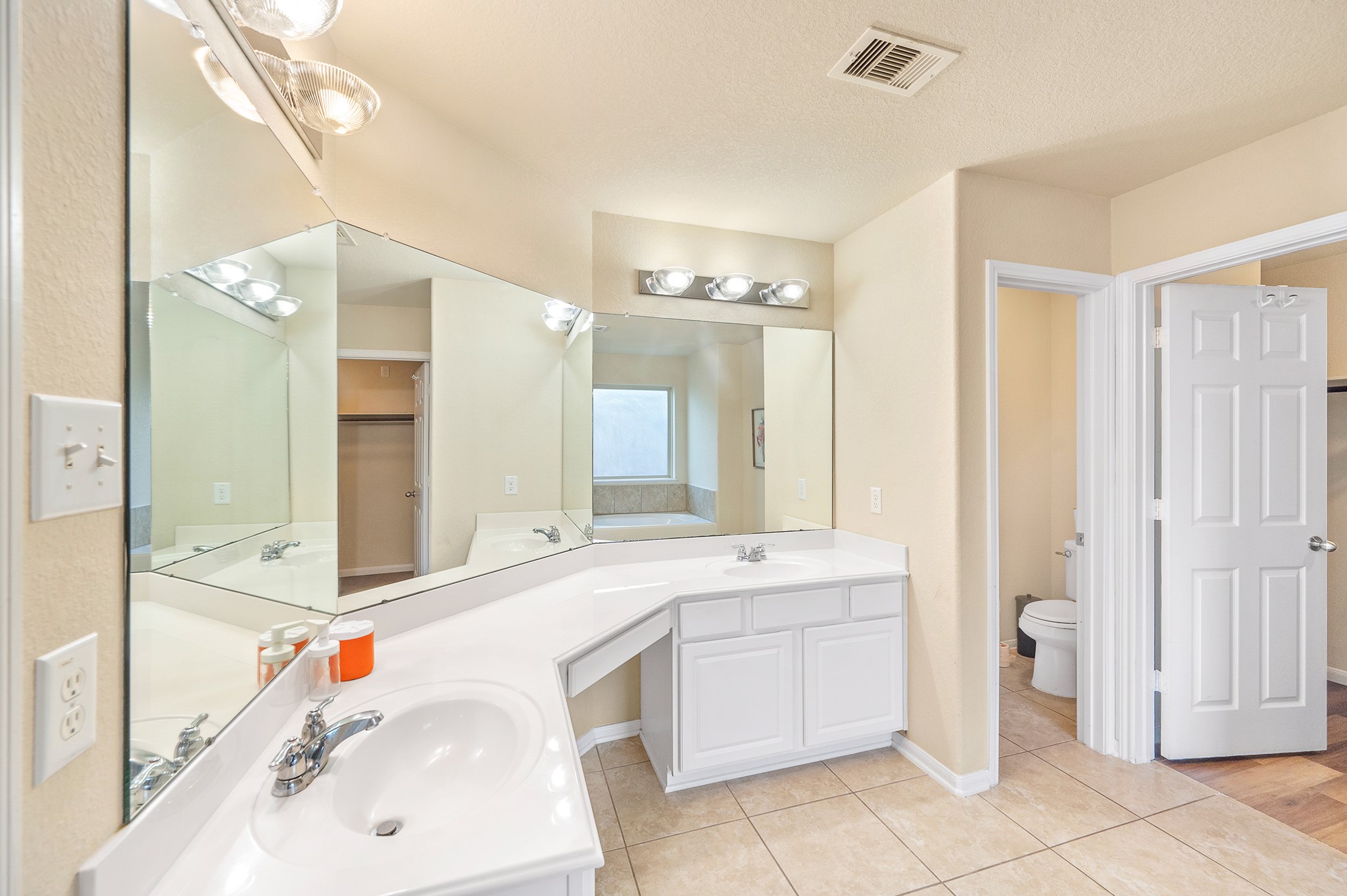 23454 Quarry Path Way Katy, TX 77493 - Photo 31 of 39 a bathroom with a sink a tub and a mirror