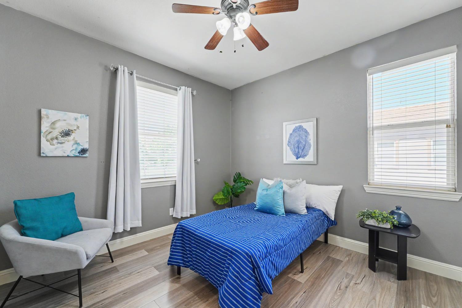 1223 East Springer Drive Turlock, CA 95382 - Photo 34 of 48 a bedroom with a bed and window