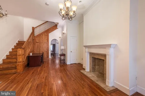 a view of entryway with wooden floor