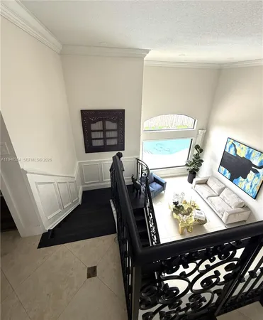 a view of kitchen with furniture and window