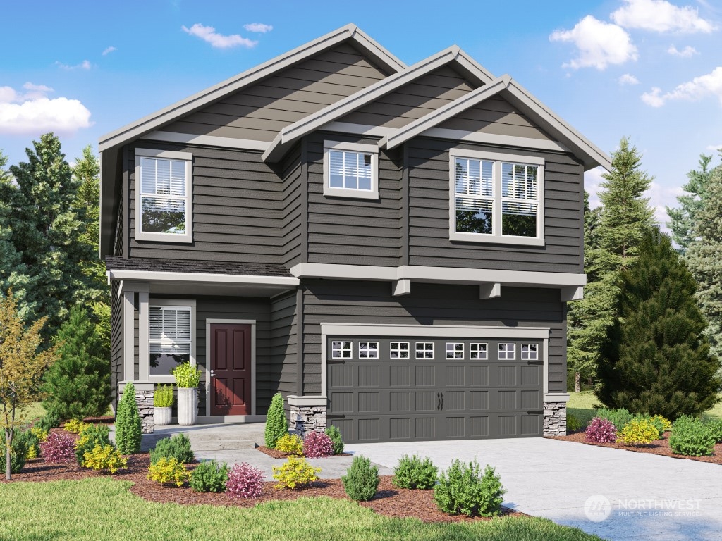 4410 228th Place South East, Unit 6 Bothell, WA 98021 - Photo 1 of 38 a front view of a house with a yard
