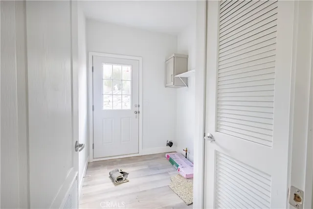 a bathroom with a sink and a window