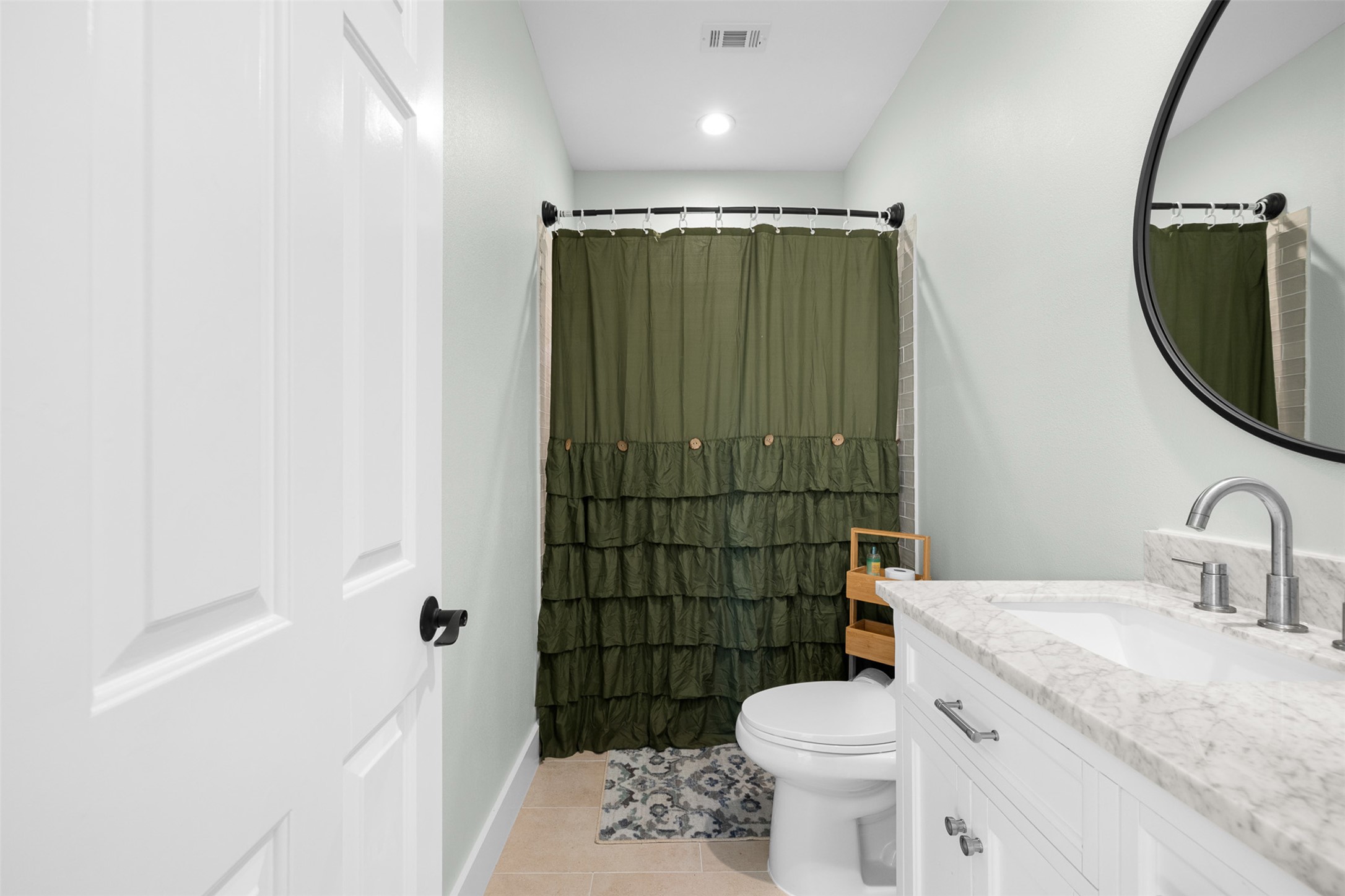 1759 Gotier Trace Road Paige, TX 78659 - Photo 16 of 40 a bathroom with a sink a toilet and shower