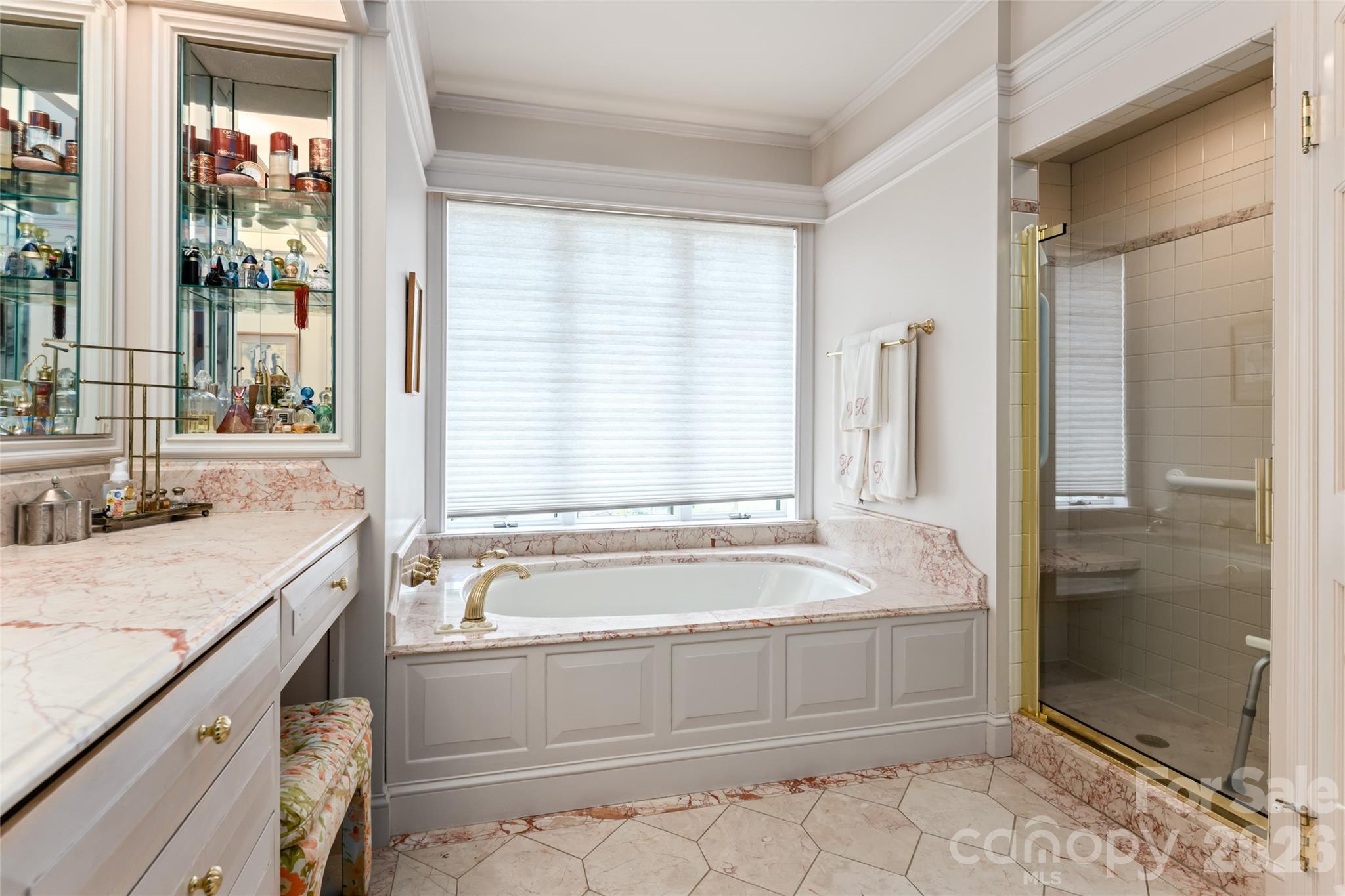 2531 Little River Road Hendersonville, NC 28739 - Photo 18 of 48 a spacious bathroom with sink shower and bathtub