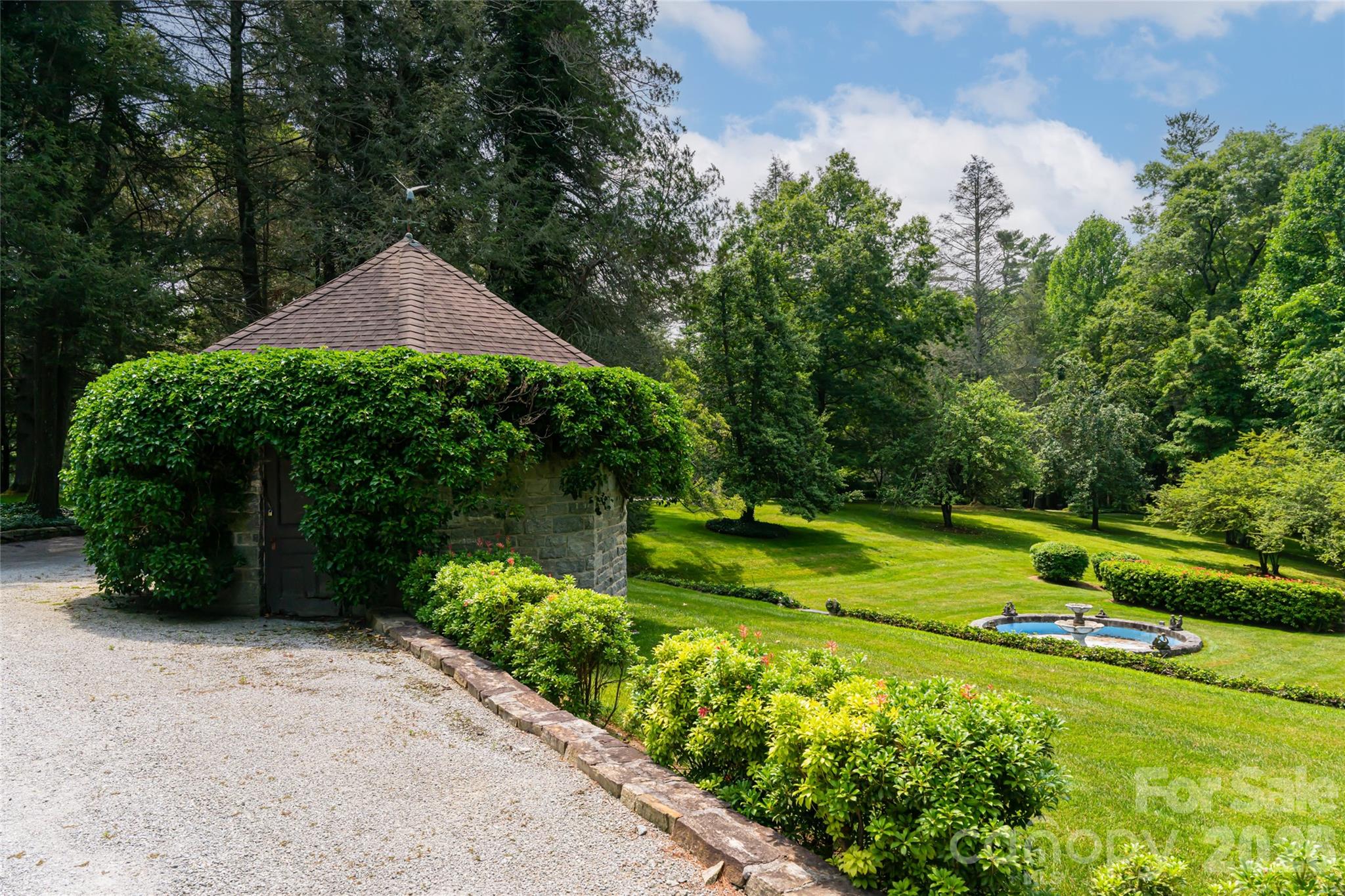 2531 Little River Road Hendersonville, NC 28739 - Photo 40 of 48 a front view of a house with a yard