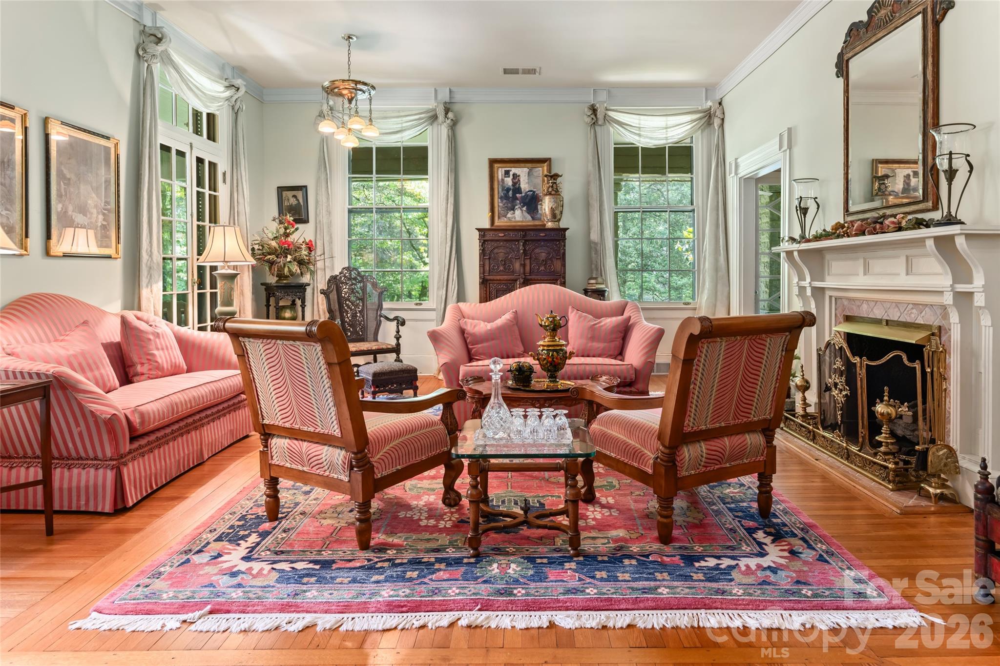 2531 Little River Road Hendersonville, NC 28739 - Photo 8 of 48 a living room with furniture and a fireplace