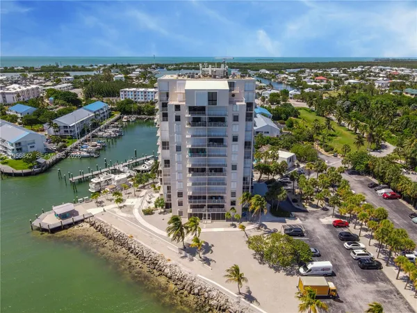 a view of a lake with a building in the background