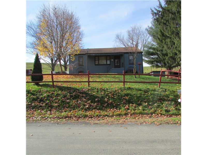 261 Little Blue Road Georgetown, PA 15043 - Photo 1 of 7 Exterior Front. FRONT SOLID BUILT CONCRETE BLOCK RANCH. APPROX 1.0 ACRE. COUNTRY SETTING. 2 CAR DET.GARAGE.