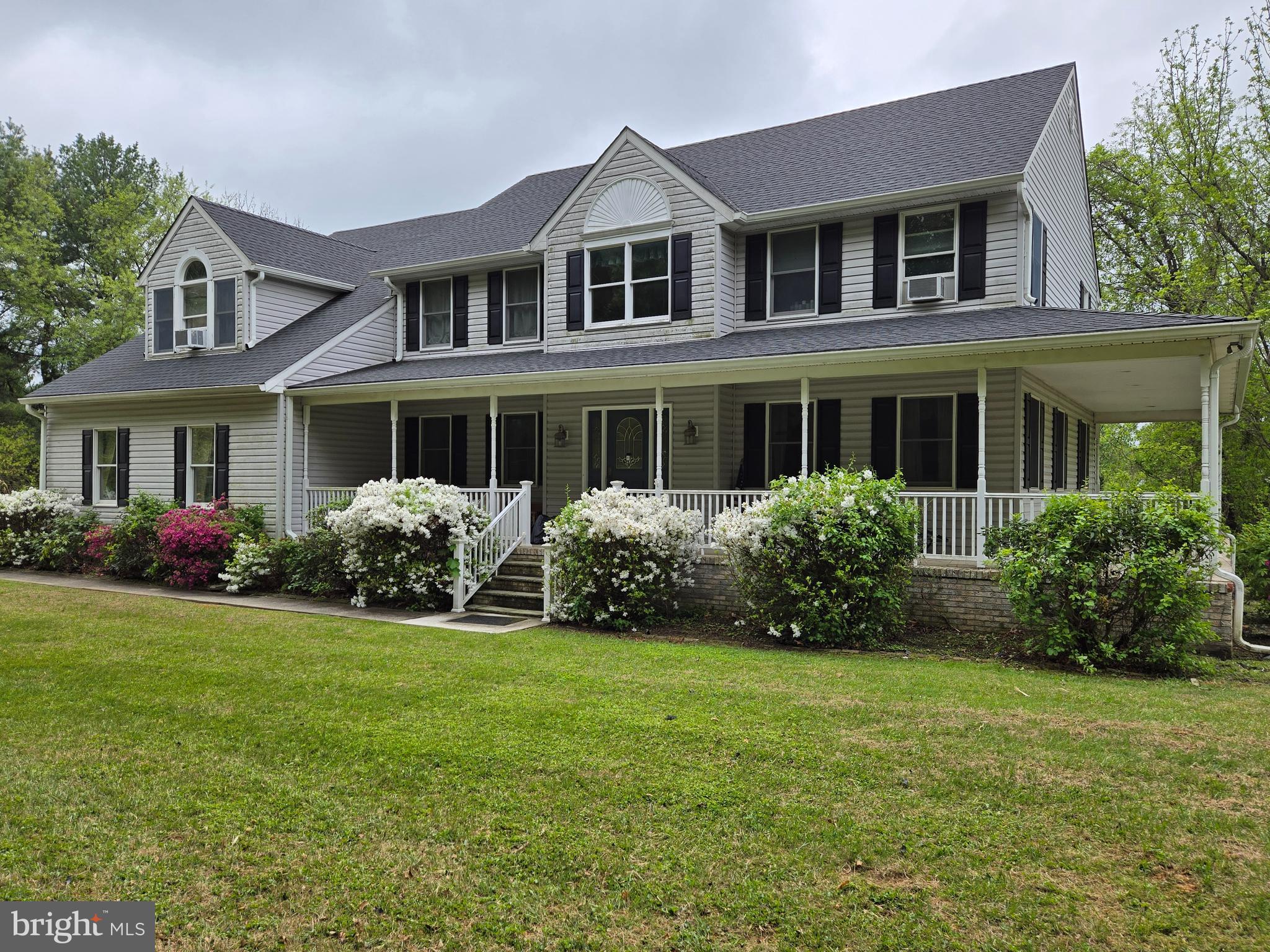 3314 Charles Street Fallston, MD 21047 - Photo 1 of 26 a front view of a house with garden and porch