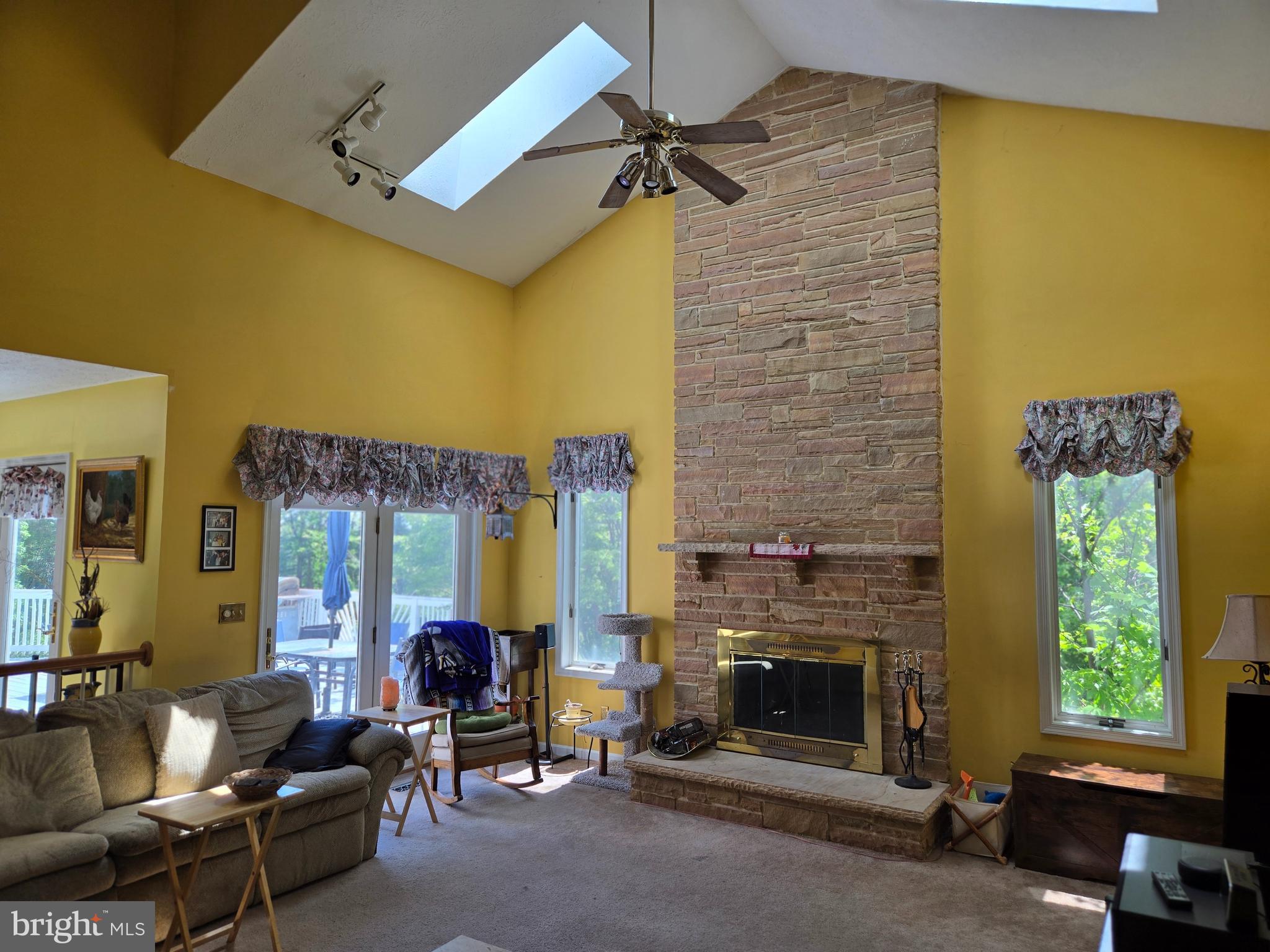 3314 Charles Street Fallston, MD 21047 - Photo 20 of 26 a living room with furniture and a fireplace