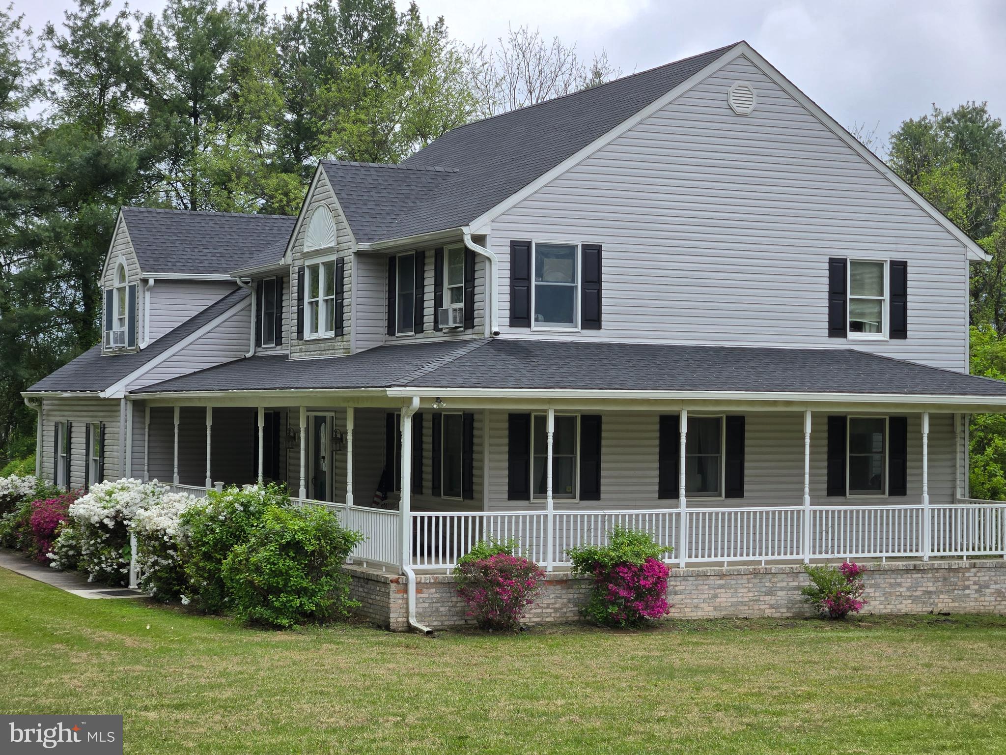 3314 Charles Street Fallston, MD 21047 - Photo 2 of 26 a front view of a house with garden