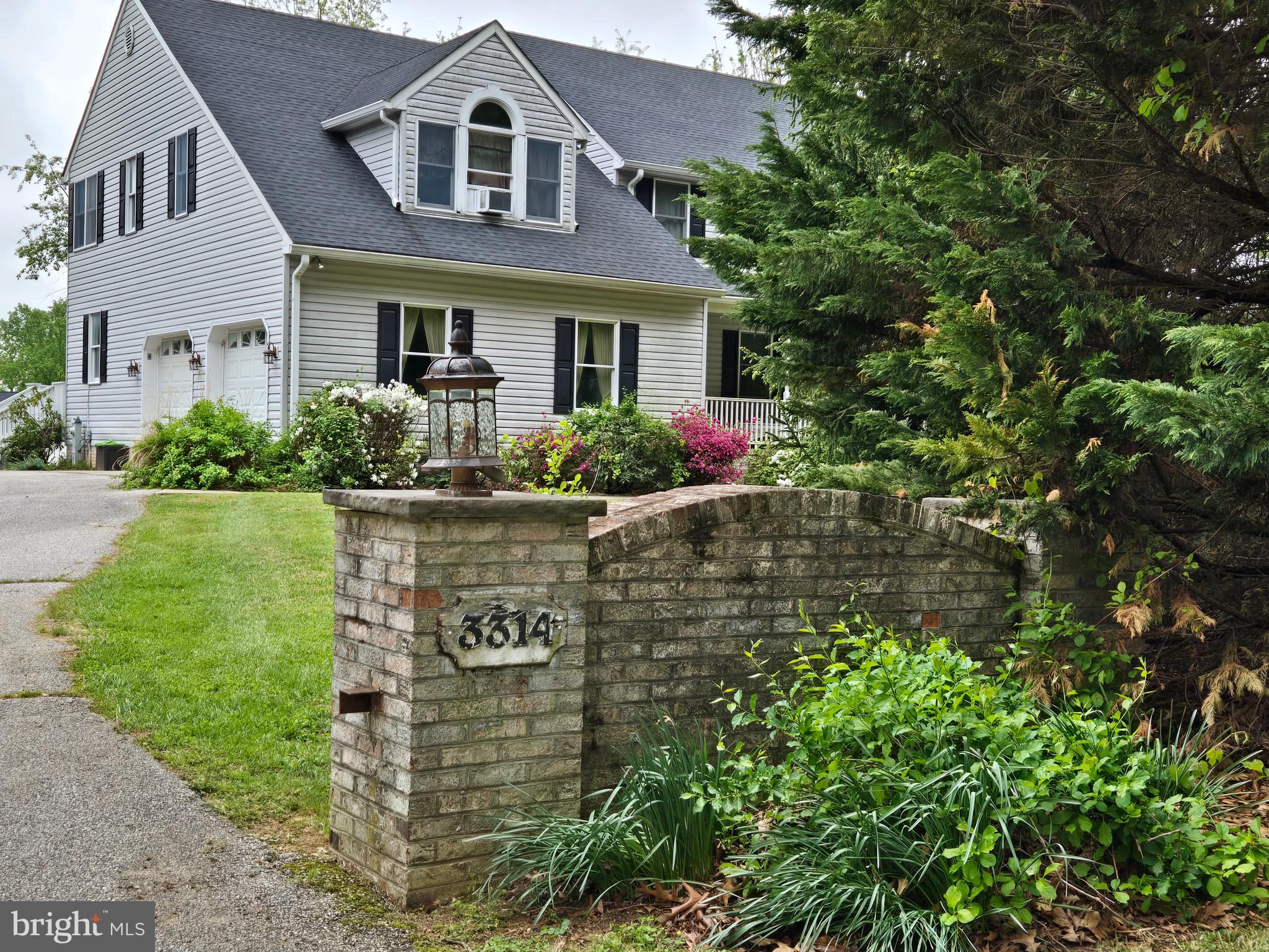 3314 Charles Street Fallston, MD 21047 - Photo 3 of 26 a front view of a house with garden