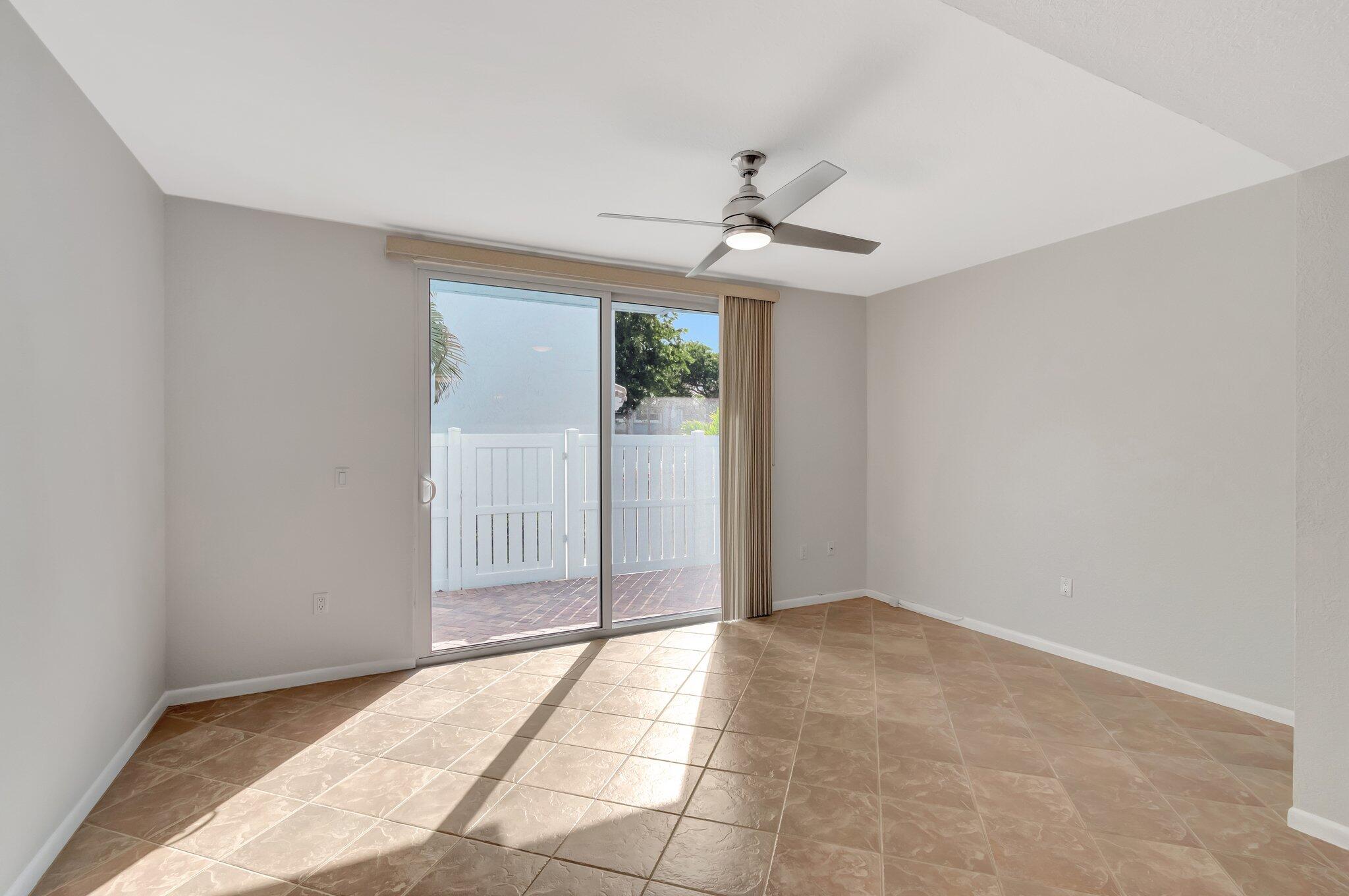 1016 Jeffery Street, Unit 1016 Boca Raton, FL 33487 - Photo 23 of 65 a view of an empty room with window