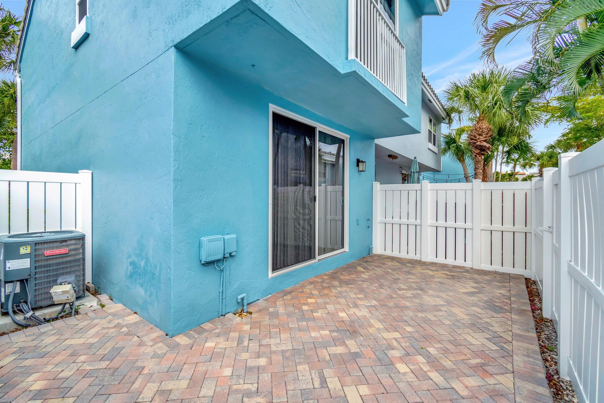 1016 Jeffery Street, Unit 1016 Boca Raton, FL 33487 - Photo 40 of 65 a view of a backyard