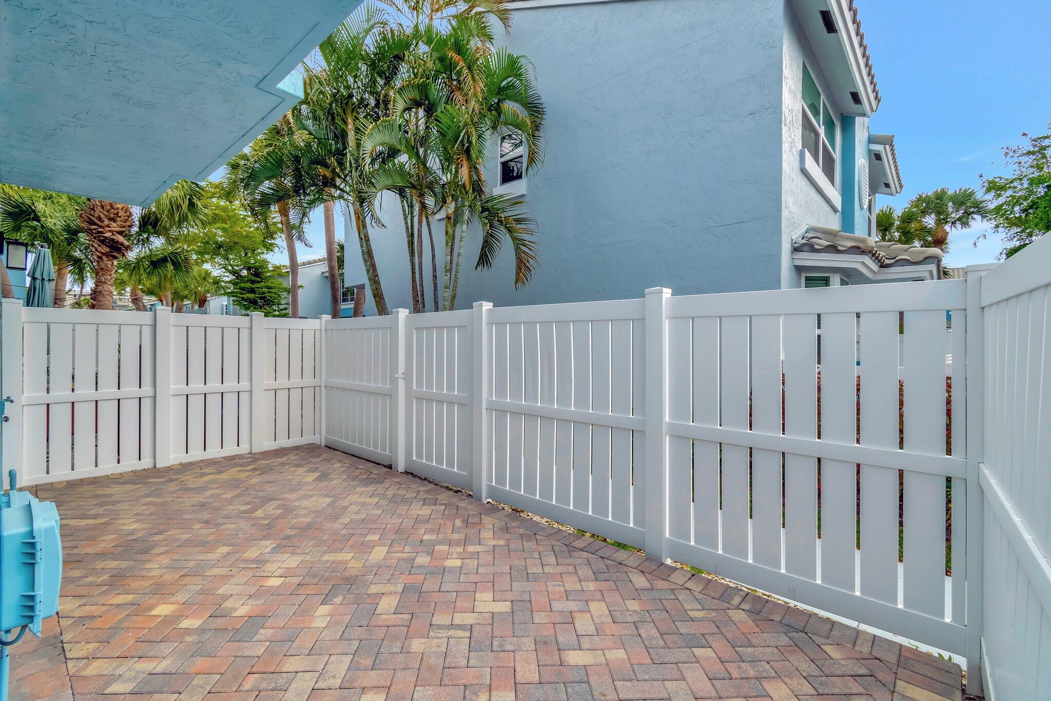 1016 Jeffery Street, Unit 1016 Boca Raton, FL 33487 - Photo 42 of 65 a view of a fence
