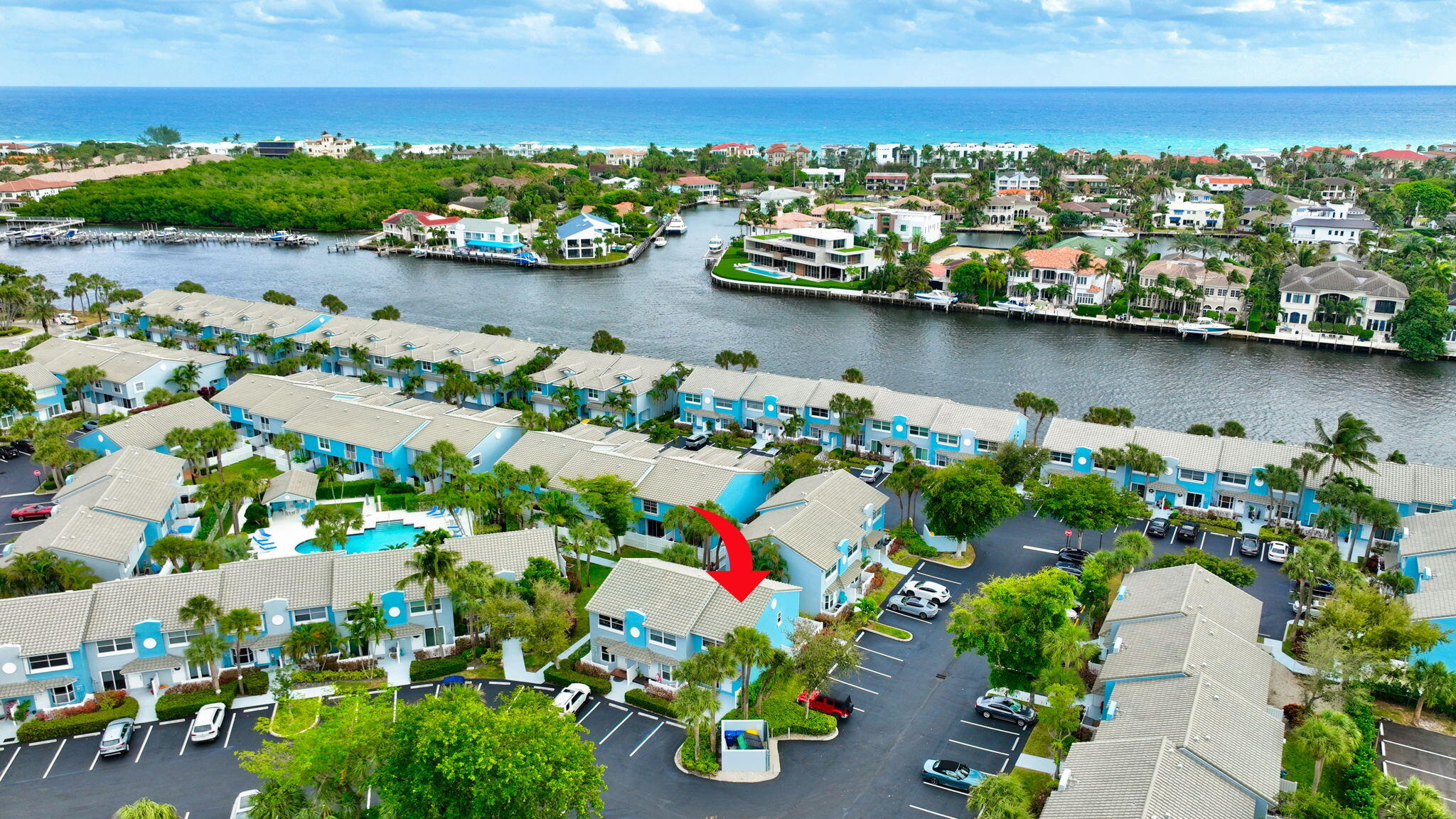 1016 Jeffery Street, Unit 1016 Boca Raton, FL 33487 - Photo 48 of 65 an aerial view of residential building and lake