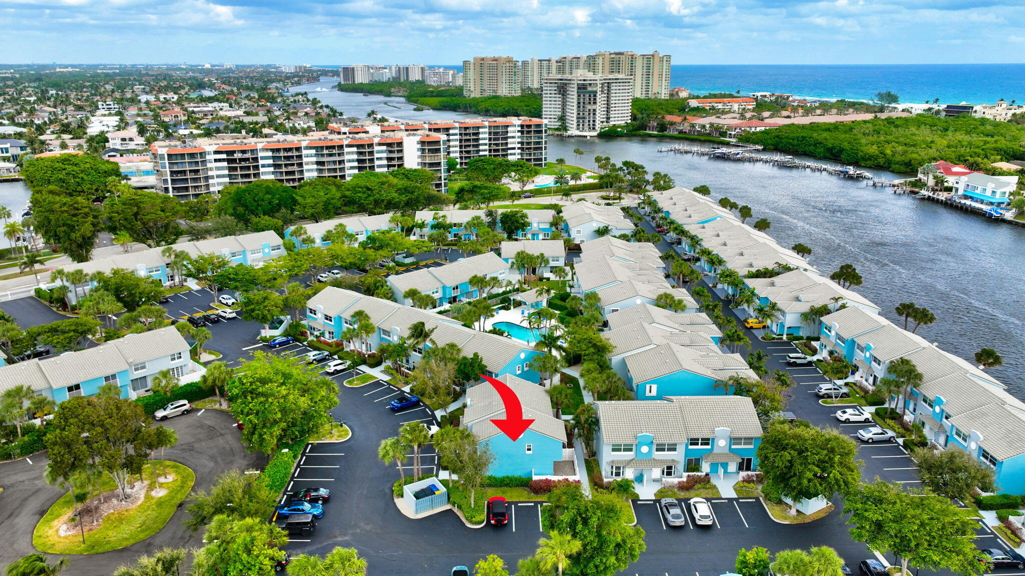 1016 Jeffery Street, Unit 1016 Boca Raton, FL 33487 - Photo 50 of 65 an aerial view of residential building and parking space