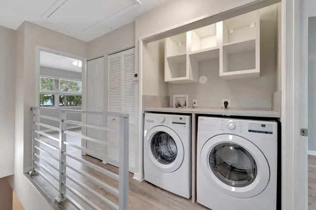 a utility room with dryer and washer