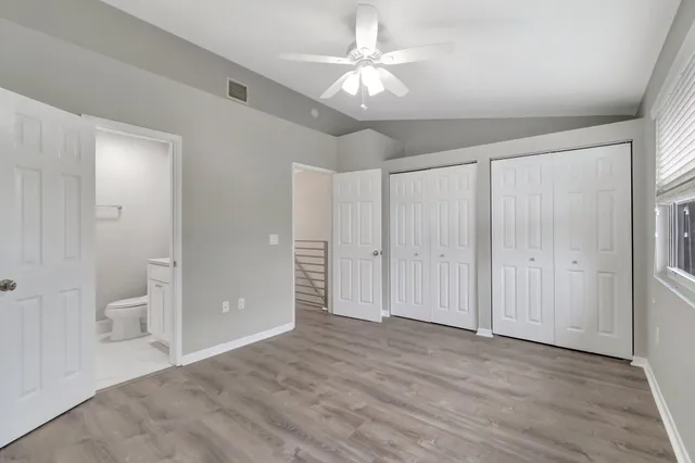 a view of a bathroom with a glass door and shower