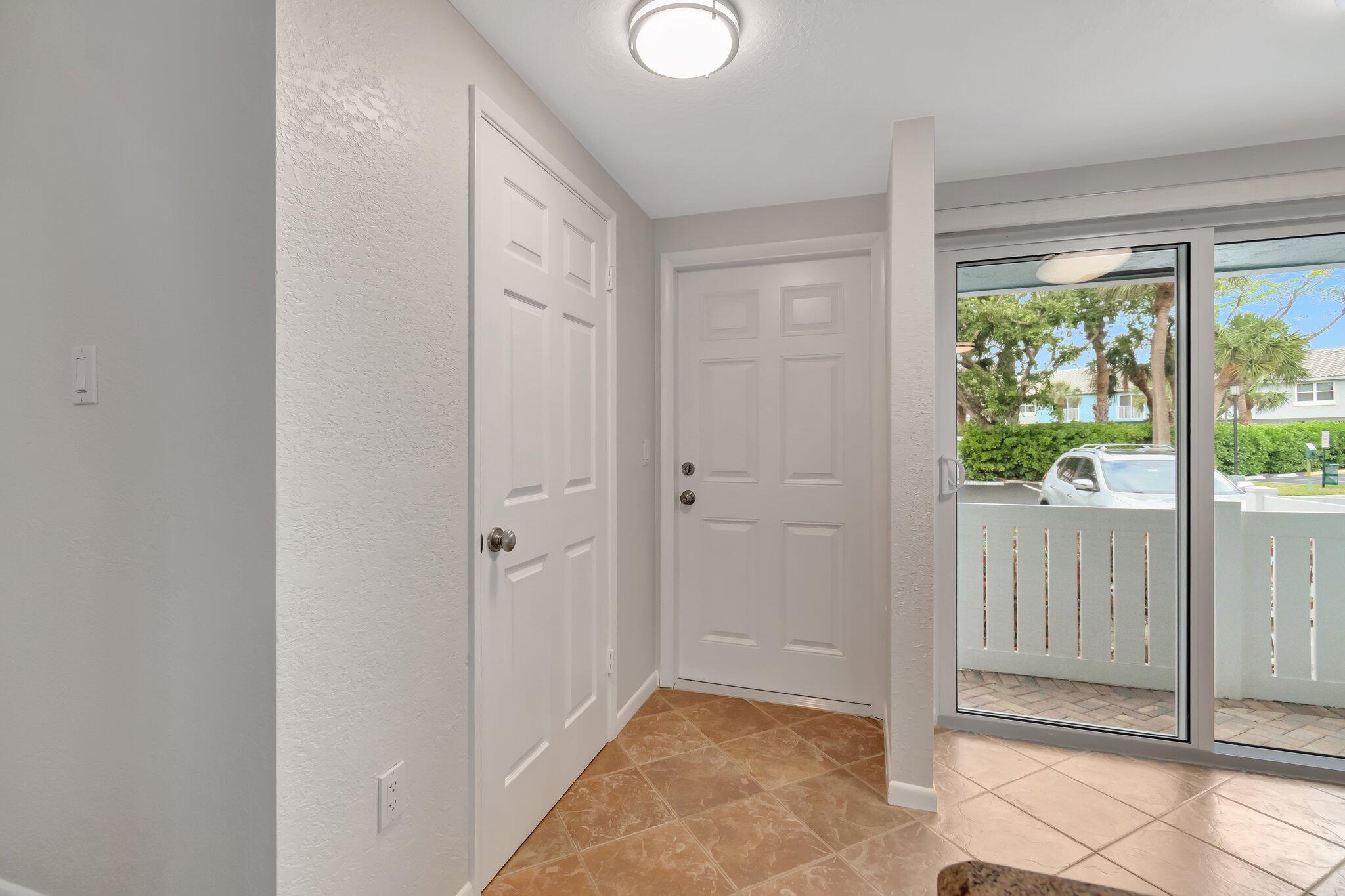 1016 Jeffery Street, Unit 1016 Boca Raton, FL 33487 - Photo 10 of 65 a view of a bathroom with a glass door and shower