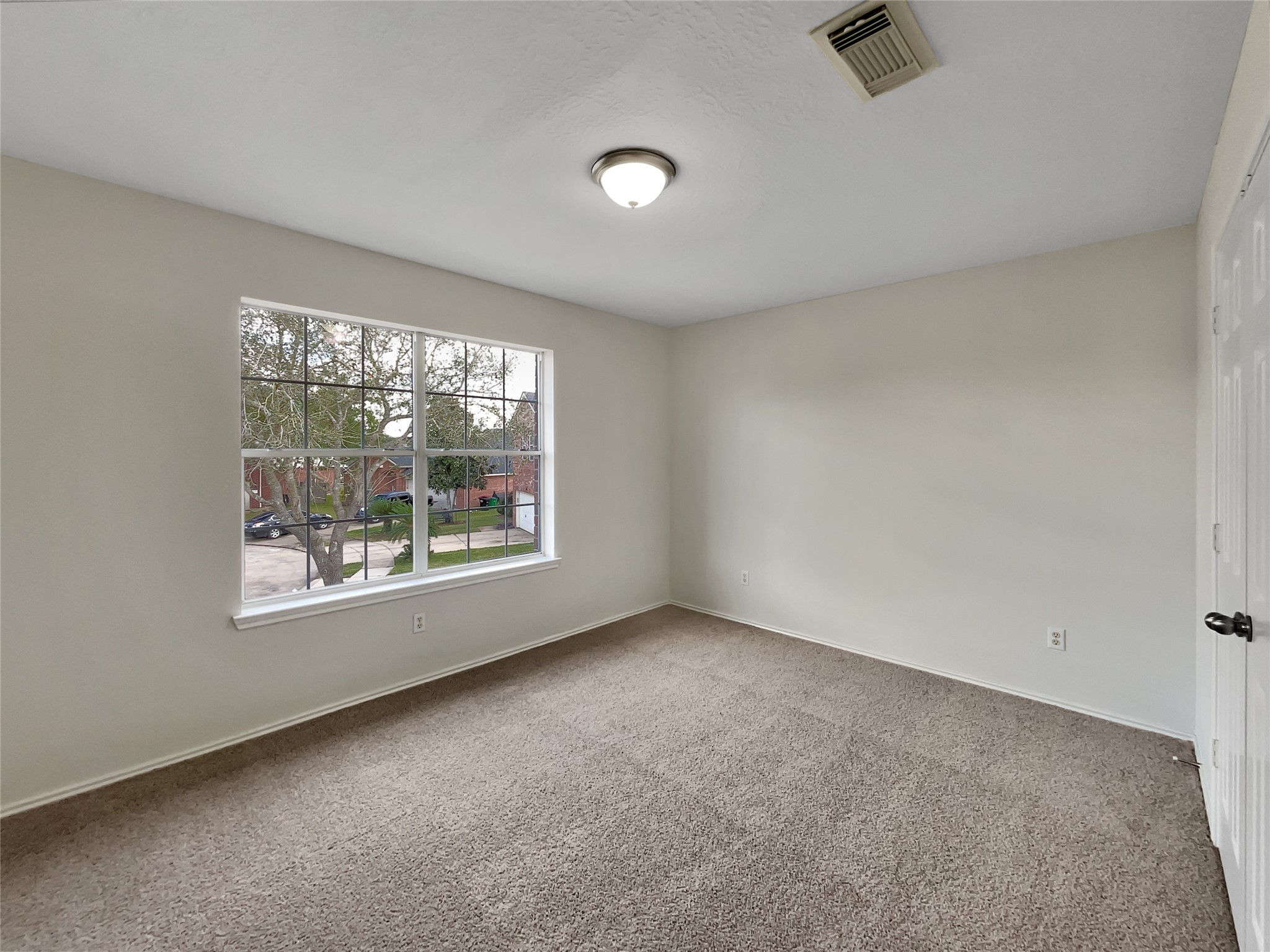 2618 Balsam Ridge Way Fresno, TX 77545 - Photo 14 of 20 an empty room with a window