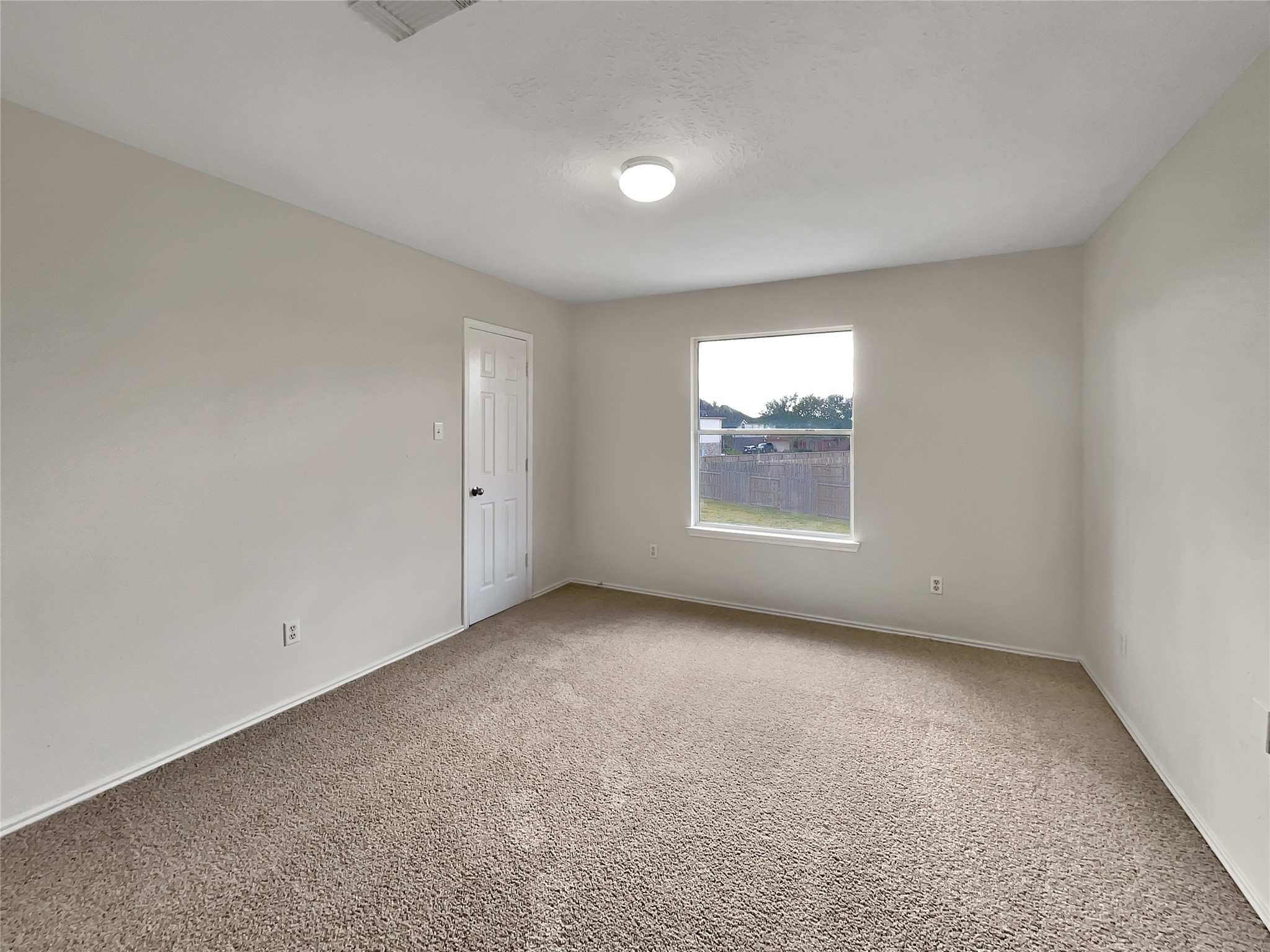 2618 Balsam Ridge Way Fresno, TX 77545 - Photo 4 of 20 an empty room with windows