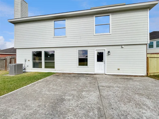 a front view of a house with garage