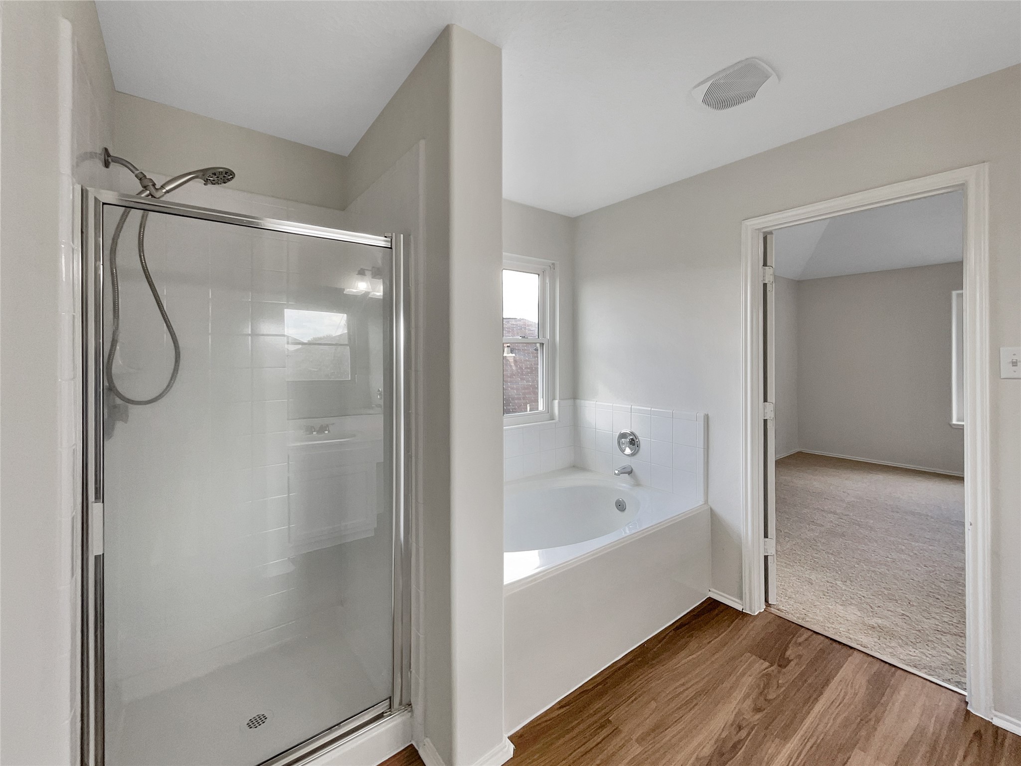 2618 Balsam Ridge Way Fresno, TX 77545 - Photo 6 of 20 a bathroom with a bathtub shower and a sink
