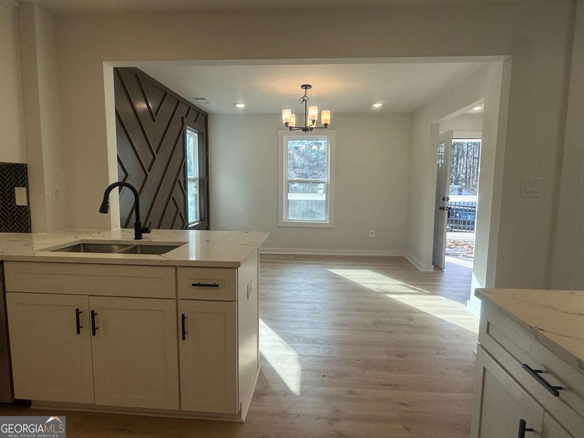 3112 North Avenue Decatur, GA 30033 - Photo 18 of 52 a view of a kitchen cabinets and wooden floor